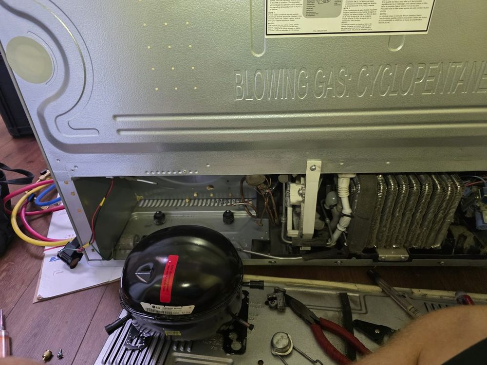 LG linear compressor replacement during refrigerator repair