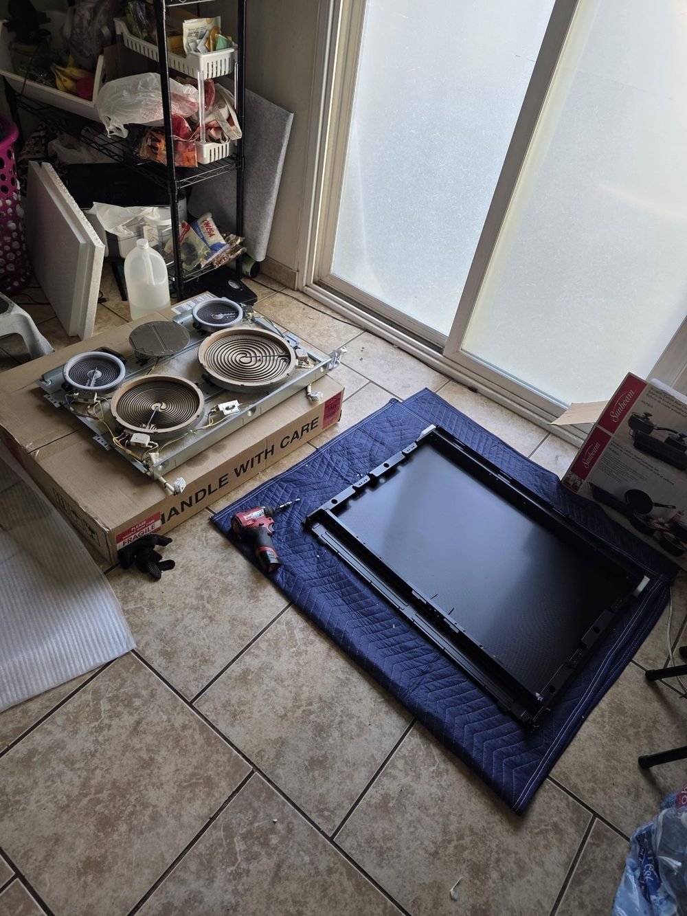 Electric cooktop elements exposed during on-site repair